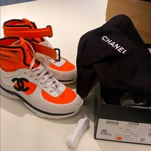 Chanel high top sneaker used with box dust bag and extra shoe laces